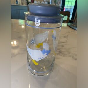 Vintage Blue Ribbon Geese canister with blue lid.